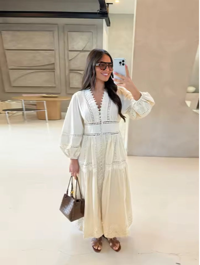 Luxe maxi-jurk met kanten details en ballonmouwen