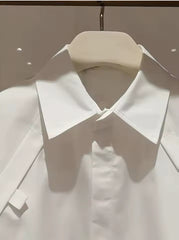Witte geborduurde blouse met korte vleermuismouwen