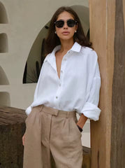 Losvallende katoenen blouse in effen kleur met lange mouwen