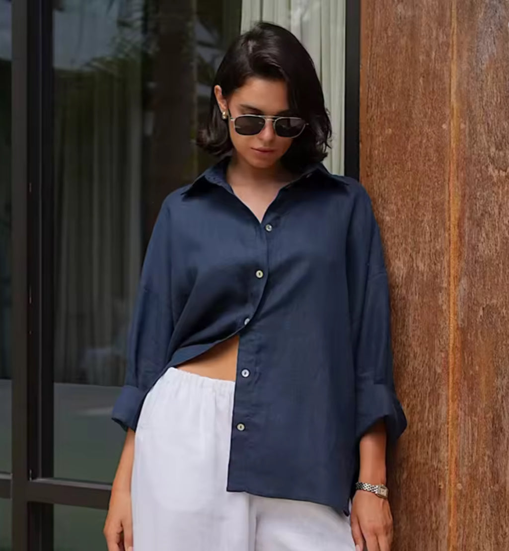 Losvallende katoenen blouse in effen kleur met lange mouwen