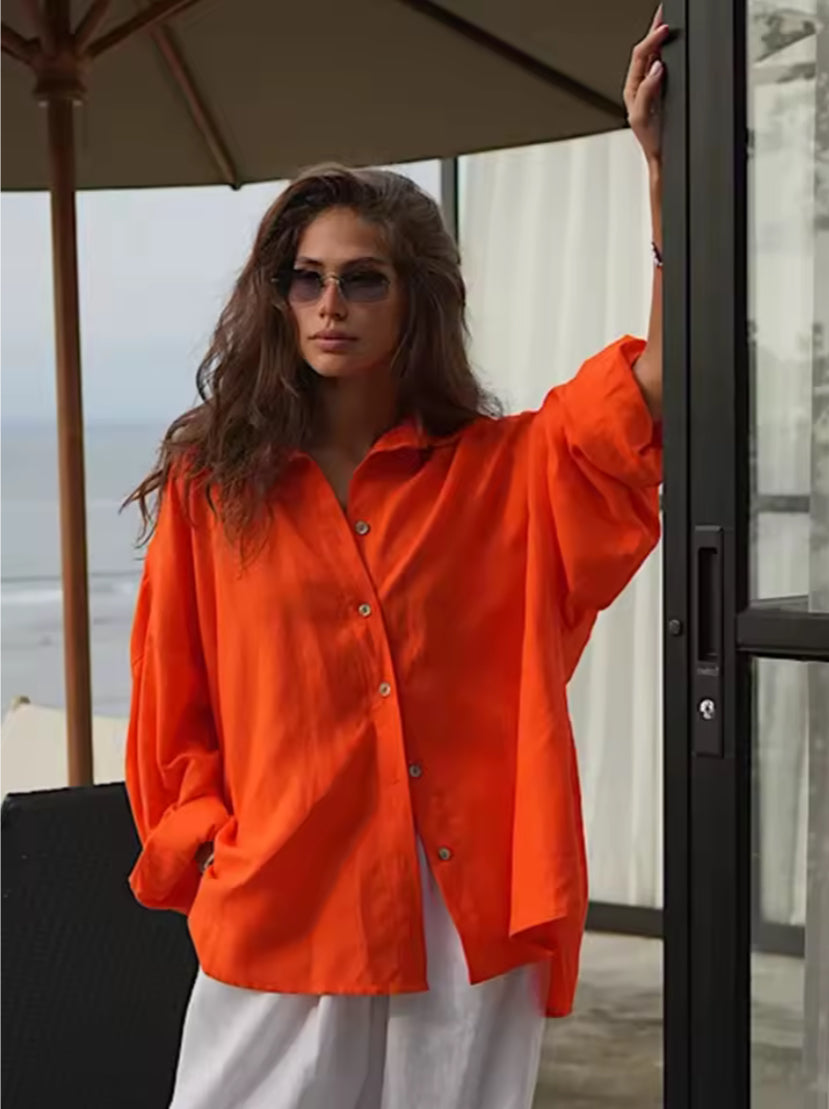Losvallende katoenen blouse in effen kleur met lange mouwen