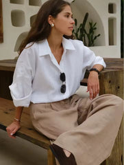 Losvallende katoenen blouse in effen kleur met lange mouwen
