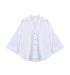 Oversized damesblouse met V-hals en opgerolde mouwen