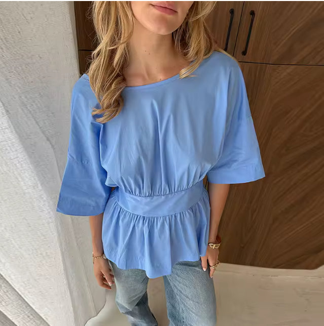 Elegante top met open rug en strikdetail