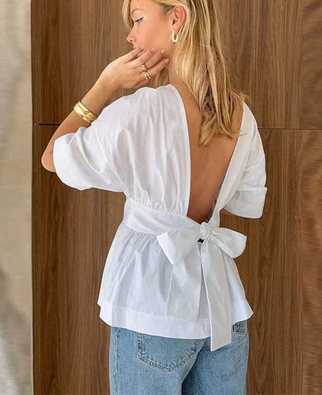 Elegante top met open rug en strikdetail