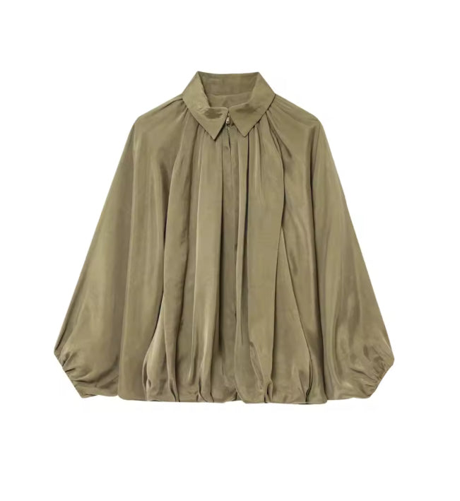 Losvallende blouse met vleermuismouwen en ritssluiting