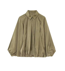 Losvallende blouse met vleermuismouwen en ritssluiting