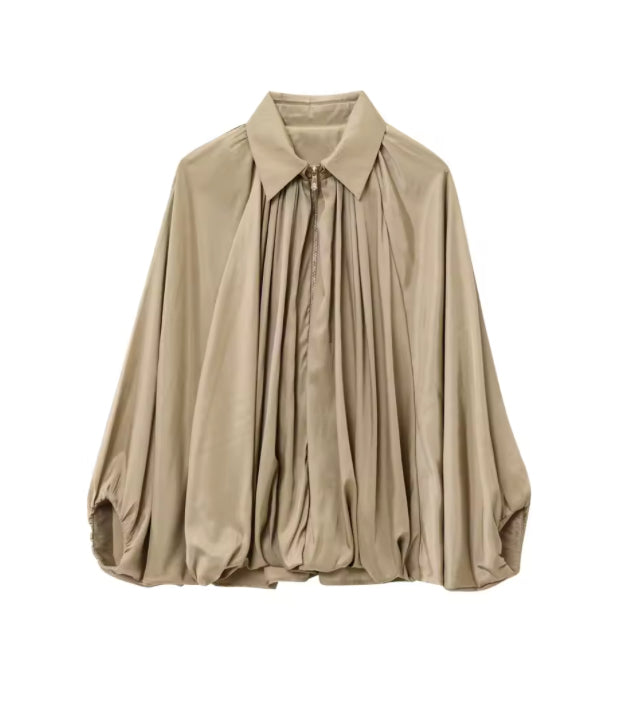 Losvallende blouse met vleermuismouwen en ritssluiting