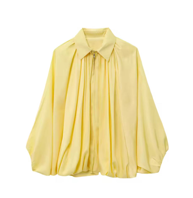 Losvallende blouse met vleermuismouwen en ritssluiting