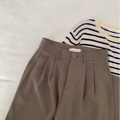 Hoge taille rechte pantalon met knoopsluiting