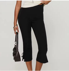 Capribroek met strikdetail en stretch fit